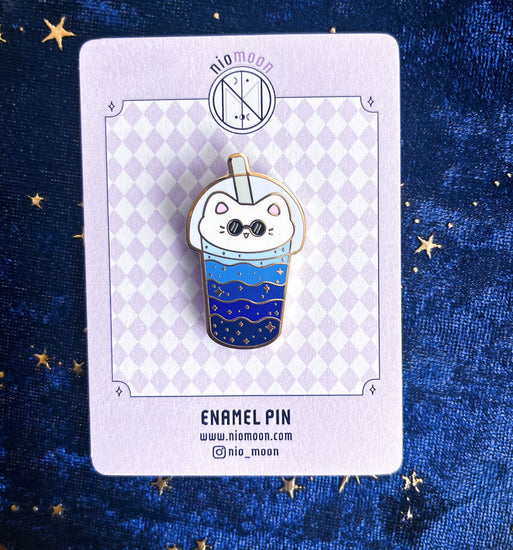 cat boba enamel pin on a backer card display