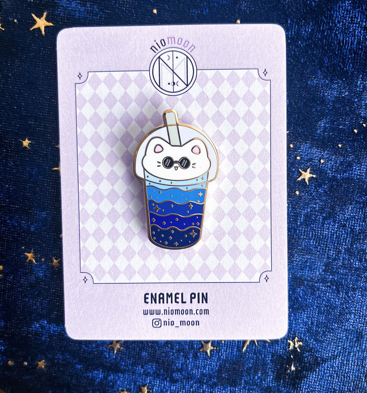 cat boba enamel pin on a backer card display