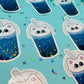 multiple cat boba gleaming holographic stickers aligned in a pattern